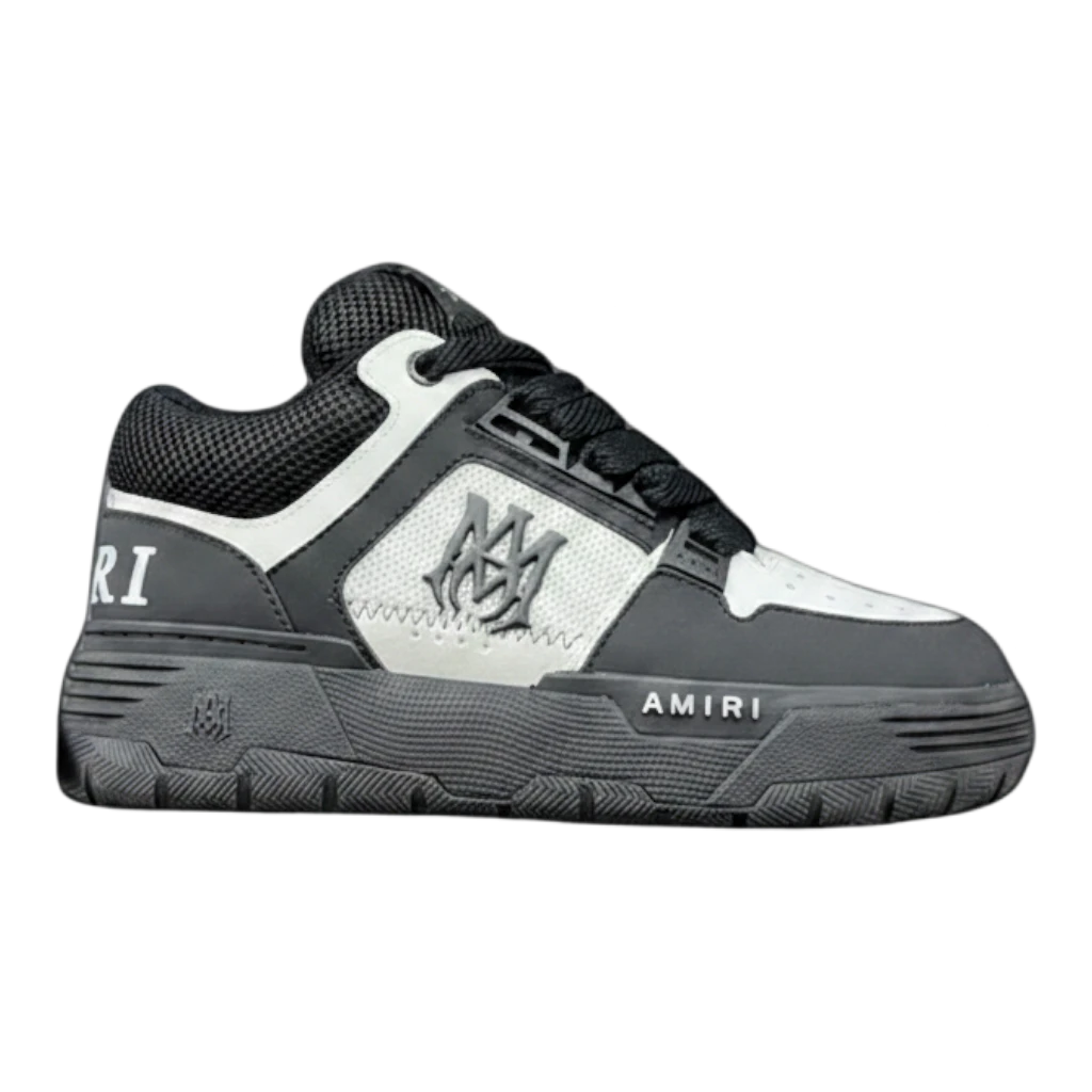 Zapatillas Dripbcnoficial AMIRI MA-1 en color negro y blanco con diseño de paneles y logo lateral